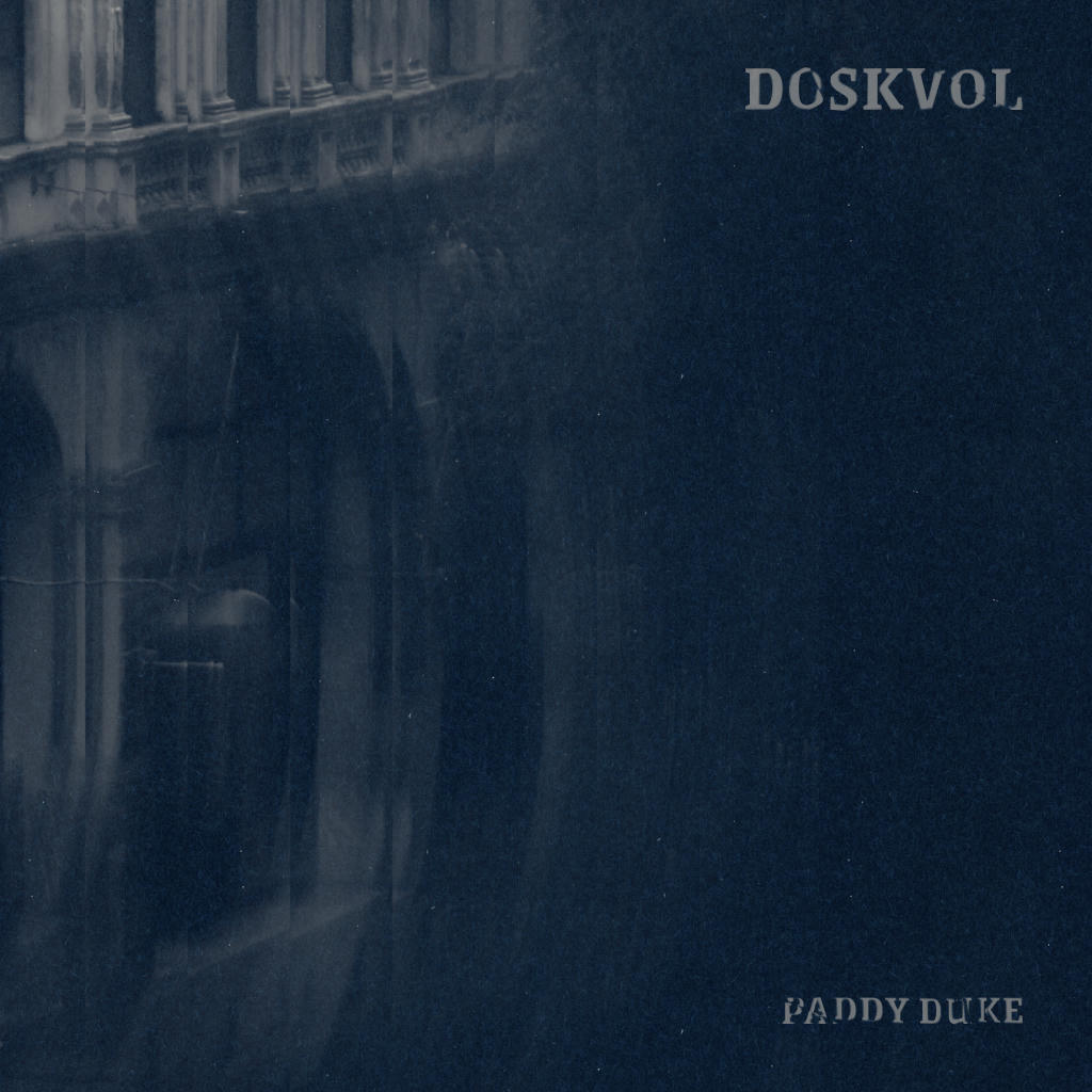 A dark, moody abstract image of some classical architectural shapes. The image is fractured and repeating in a way that feels like a broken mirror or a ripple in reality.